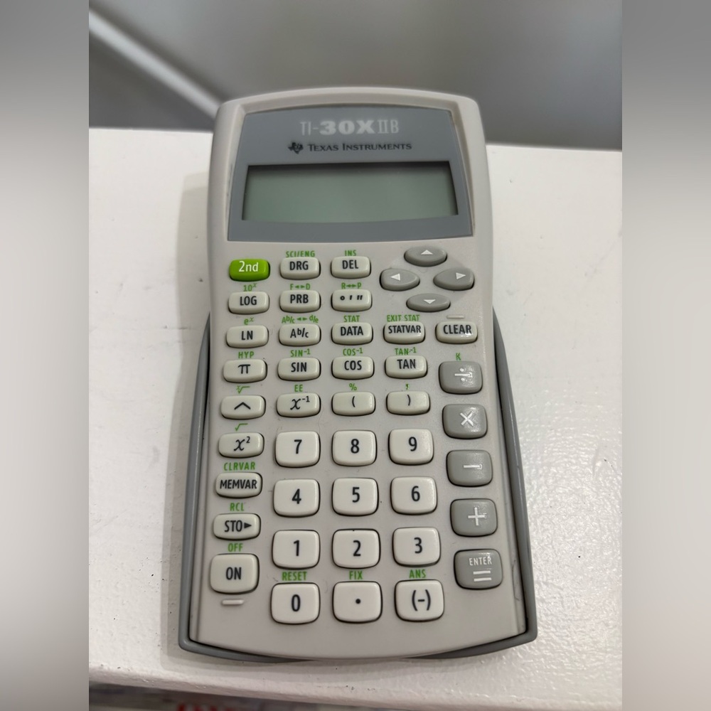Texas Instruments TI-30X IIB Calculator in Gray and White collage student